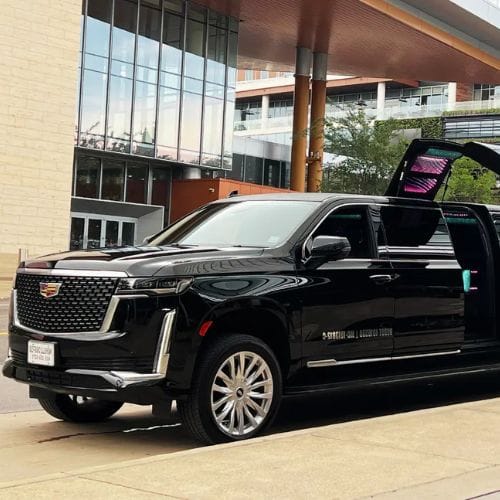 A black escalade stretch limousine for chauffeur service