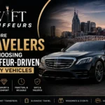 Professional chauffeur standing beside a luxury black sedan with the Swift Chauffeurs logo, representing premium chauffeur-driven transportation in Nashville.